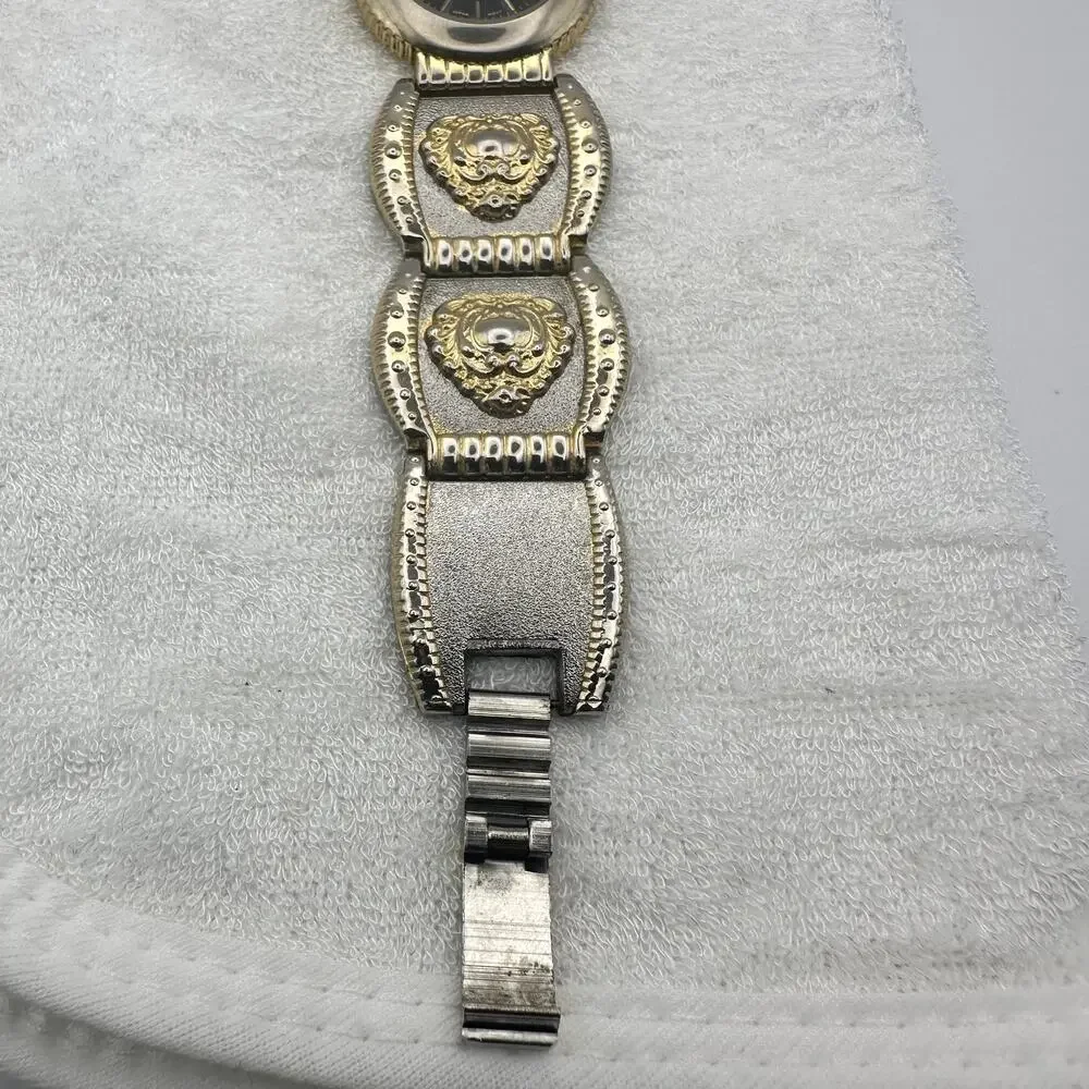 Xanadu Quartz Watch Two Tone Gold Silver Ornate Link Bracelet Black Dial